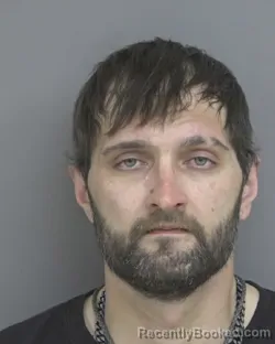 Mugshot of DEREK LEE SPENCER booked in Dubuque County, Iowa on March 31, 2026