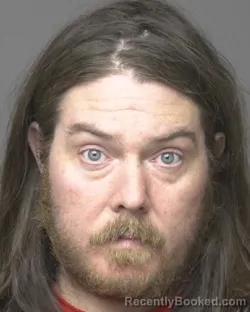 Mugshot of JOHN DONALD TERRIS booked in Dubuque County, Iowa on March 31, 2026