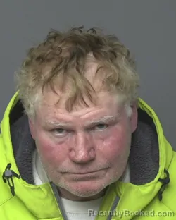 Mugshot of ROBERT EDWARD WOLF booked in Dubuque County, Iowa on April 8, 2026