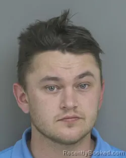 Mugshot of LOGAN MICHAEL FETTKETHER booked in Dubuque County, Iowa on April 25, 2026