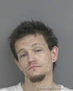 Mugshot of CHAD MICHAEL SCHMITT booked in Dubuque County, Iowa on April 27, 2026