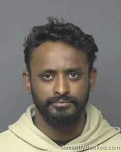 Mugshot of RAIHAN MAIL/13 BHUYAIN booked in Dubuque County, Iowa on May 8, 2026