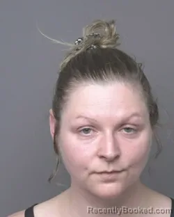 Mugshot of TORI NATALIA CUROE booked in Dubuque County, Iowa on May 10, 2026