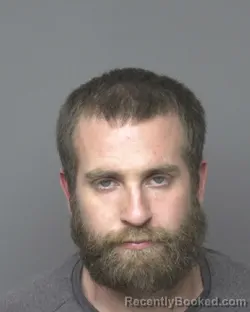 Mugshot of JAMIE SCOTT HUNTINGTON booked in Dubuque County, Iowa on May 11, 2026