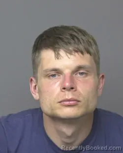 Mugshot of DMITRY ADAM KOBUSCH booked in Dubuque County, Iowa on May 14, 2026