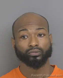 Mugshot of TYSHAWN JERMELL COSSOM booked in Dubuque County, Iowa on May 15, 2026