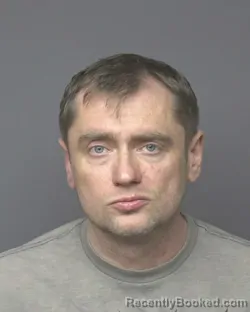 Mugshot of JEREMY MICHAEL NEUHAUS booked in Dubuque County, Iowa on May 22, 2026