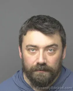 Mugshot of BRANDON CYRIL DAVIES booked in Dubuque County, Iowa on June 19, 2026