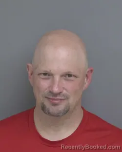 Mugshot of DANIEL GANE FINDLEY booked in Dubuque County, Iowa on June 19, 2026