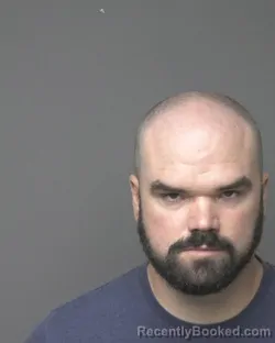 Mugshot of TRAVIS EARL HAMBLIN booked in Dubuque County, Iowa on June 30, 2026