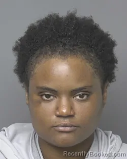 Mugshot of Jasmine Lashay Cotton booked in Dubuque County, Iowa on July 31, 2026