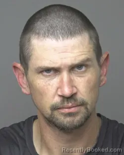 Mugshot of Matthew Lawrence Robert Ahern booked in Dubuque County, Iowa on July 31, 2026