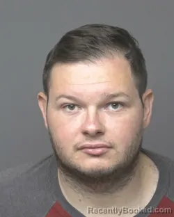 Mugshot of Tyler John Gillitzer booked in Dubuque County, Iowa on August 5, 2026