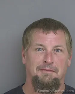 Mugshot of Jason Anthony Lenz booked in Dubuque County, Iowa on August 9, 2026