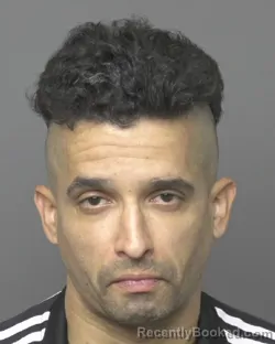 Mugshot of Carlos Francisco Marin-Lopez booked in Dubuque County, Iowa on August 14, 2026