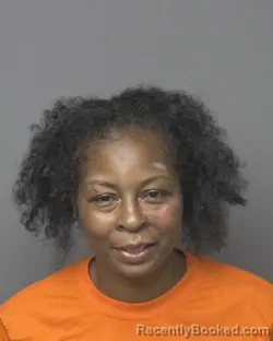 Mugshot of Camisha Laetta Dixon booked in Dubuque County, Iowa on August 14, 2026