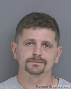 Mugshot of Brandon Allen Molzof booked in Dubuque County, Iowa on August 16, 2026