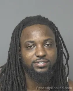 Mugshot of Denzel Michael Hayes booked in Dubuque County, Iowa on August 16, 2026